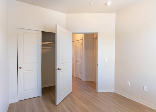 A room with a white door and a brown door at Westgate Apartment Homes, Pendleton, OR