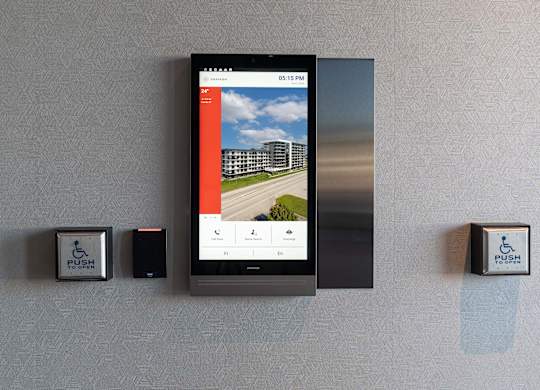 A wall-mounted device displays a weather forecast on its screen at Damask, Windsor, ON