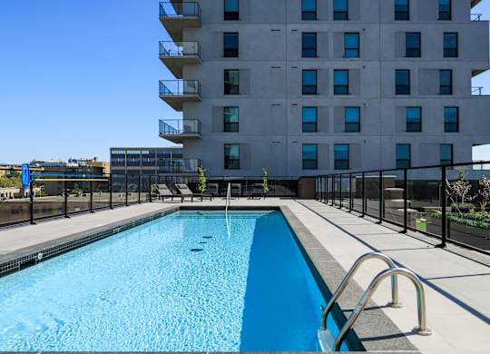 Resort Style Swimming Pool at Lynk De la Savane Apartments, Québec, H4P 0E2