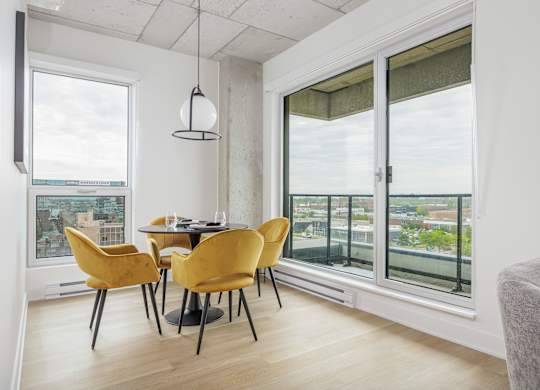 Elegant Dining Area at Lynk De la Savane Apartments, Montreal, Québec