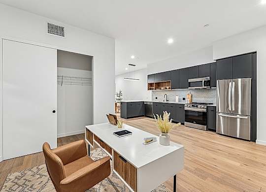 Modern kitchen with a dining at 701 Hudson, Los Angeles, California
