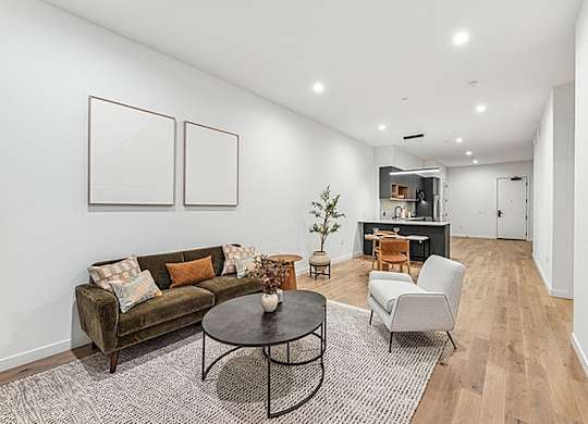 Bright living room at 701 Hudson, Los Angeles, California, 90005