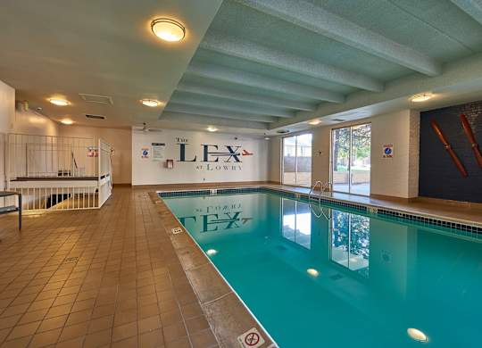 A large indoor swimming pool  at The Lex At Lowry, Denver, CO
