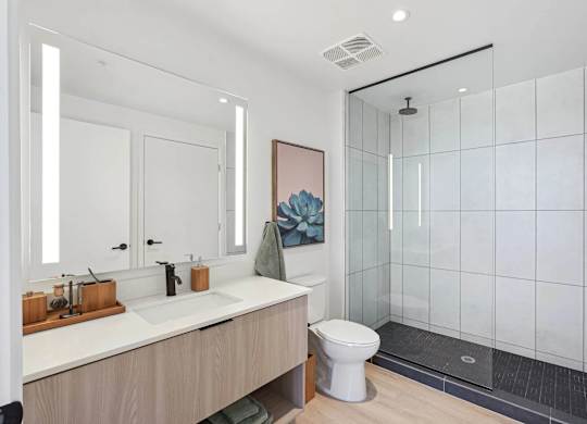 Bathroom with shower at Velaris Living Apartments, Denver, CO