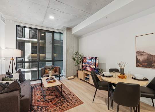 Living room with Dining table at Velaris Living Apartments, Denver, CO, 80205