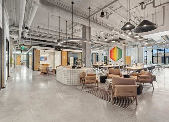 Common area with comfortable chairs at Velaris Living Apartments, Denver, CO, 80205