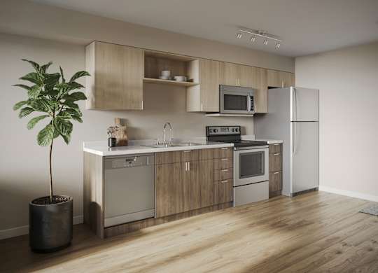 A modern kitchen with wooden cabinets and stainless steel appliances.