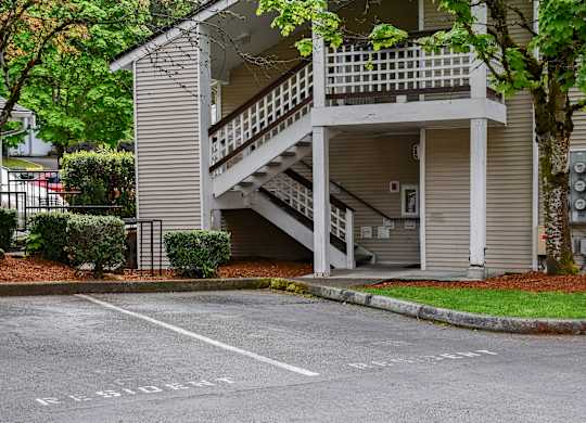 A building with a staircase leading to the entrance.