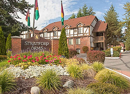 The image shows a building with the name "Stratford" on a sign in front of it.