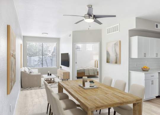 A modern dining room with a wooden table and chairs.