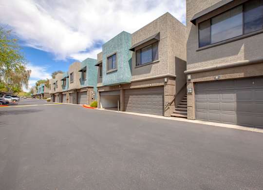 A street with apartment buildings on the side.
