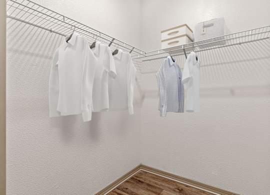 Clothes hanging on a clothes rack.