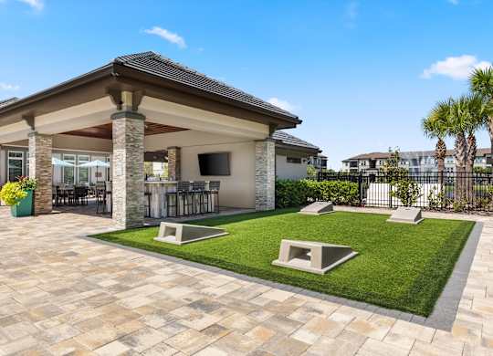 A house with a patio and a fence.