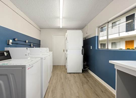 A laundry room with a washer and dryer.
