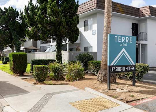 A sign for Terre at Lev is in front of a building.