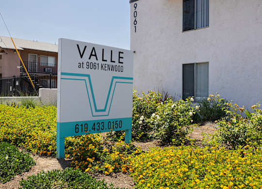 A sign for a place called VALE at 9061 Kenwood.
