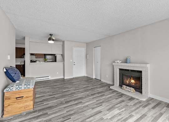A room with a fireplace and a bed.