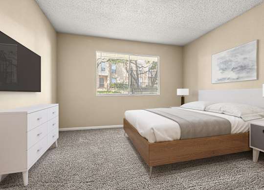 A bedroom with a bed, nightstand, and dresser.