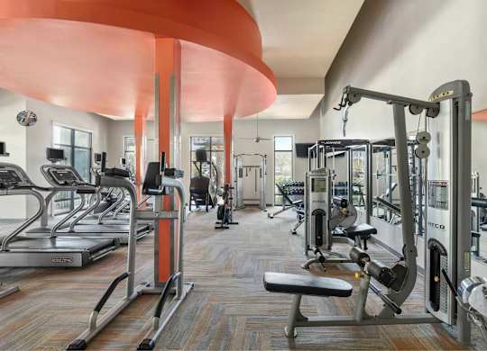 A gym with weight machines.