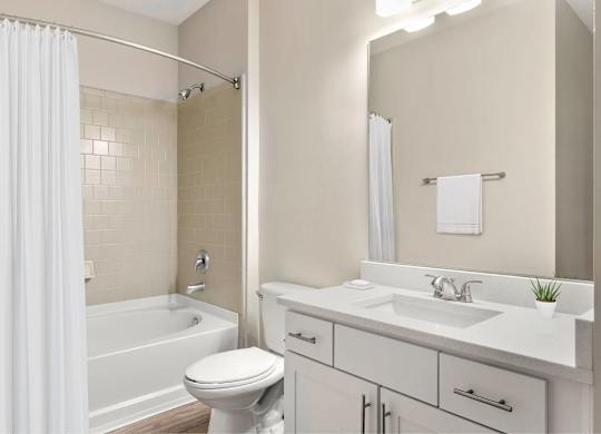 A bathroom with a bathtub.
