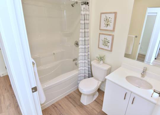 A white bathroom at Roxy Apartments, Hamilton