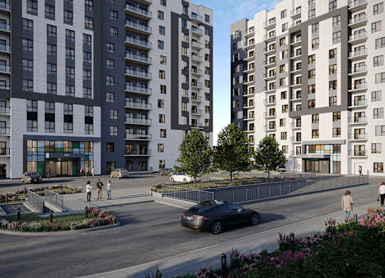 A car is driving down a street lined with modern apartment buildings at Roxy Apartments, Hamilton, ON, L8H 0B7
