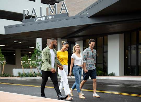 Four people walking at Palma, Florida