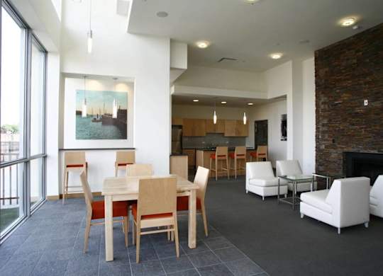 A dining room with a table and chairs.at 66 Main, Yonkers, NY