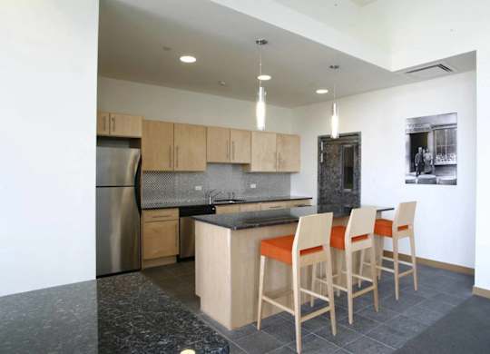 A dining room with a table and chairs.at 66 Main, Yonkers, NY