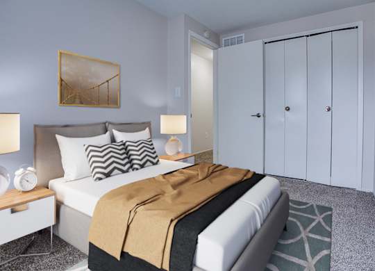 A bedroom with a bed, nightstand, and a painting on the wall.