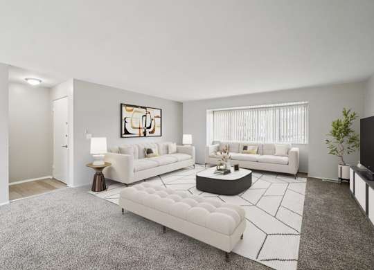 Modern living room with white furniture and a grey rug at Versailles, 25026 E Rue Versailles, MI 48237