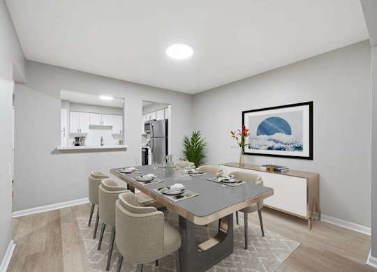 A dining room with a table set for six.