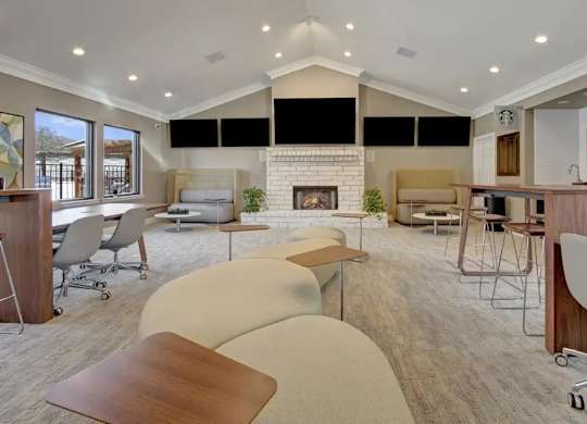 A modern living room with a fireplace and a dining area.