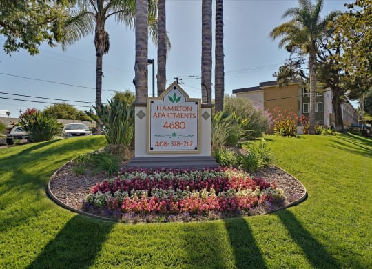 Entrance Sign in Garden at Hamilton Apartments in San Jose, CA