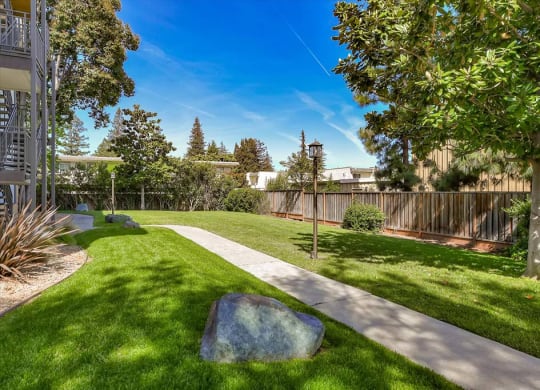 Walk paths in the garden at The Luxe, Santa Clara, CA