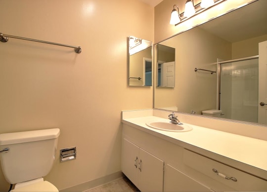 Bathroom with yellow lights at Wellesley Crescent, Redwood City, California