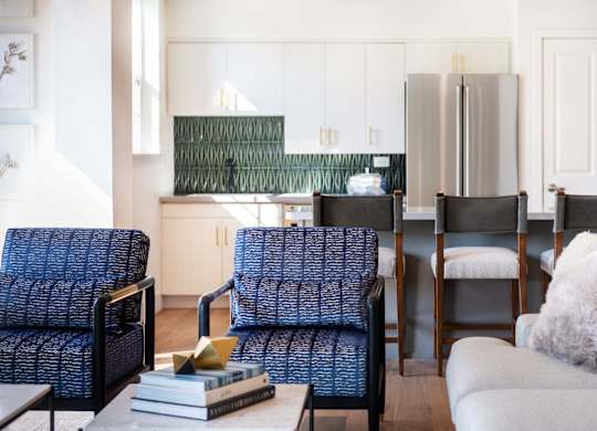 Open living and dining area with kitchen view at Rosemeade Apartments, Roseville, CA 95661