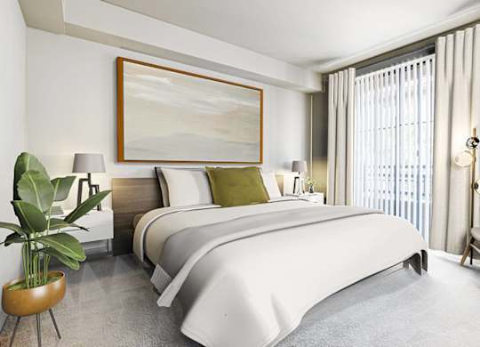 Bedroom with Large Bed at Renaissance Square, Concord