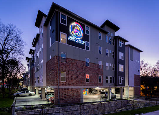 A building with the name "ARBURG" on it.