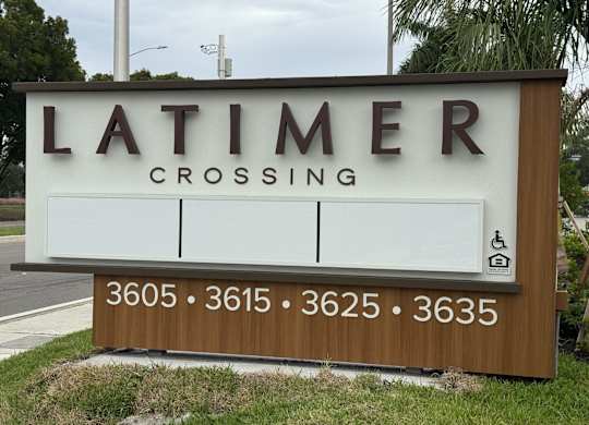 A sign for Latimer Crossing with numbers 3605, 3615, 3625, and 3635 on it.