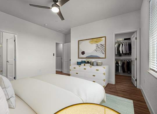 a bedroom with a large bed and a closet
