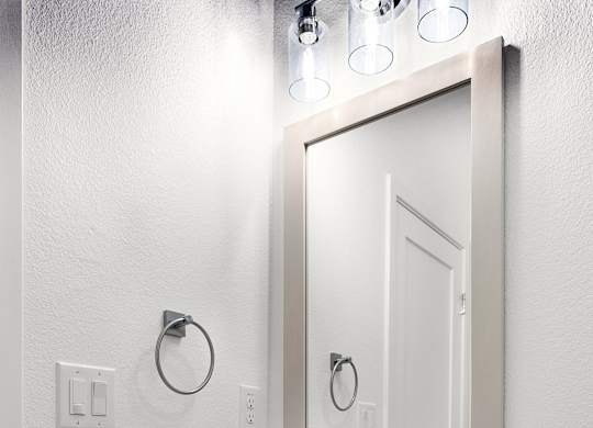 a small bathroom with a sink and a mirror