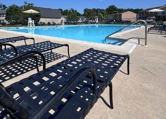 A pool with a blue sky in the background.