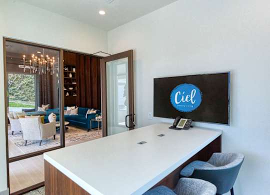 Modern conference room with glass walls at Ciel Luxury Apartments, Florida