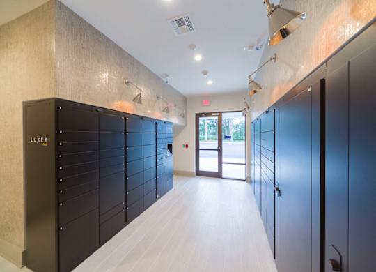 Package locker room with modern lighting at Ciel Luxury Apartments, Jacksonville, FL 32246