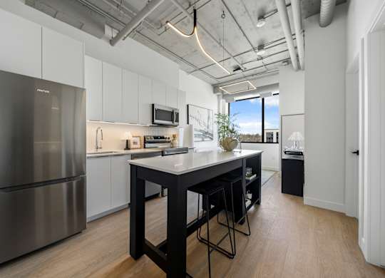 Kitchen with White Counter at Richmond Square, London