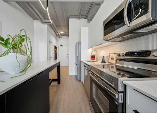 Modern Kitchen with black appliances at Richmond Square, London, ON, N6A 5M8