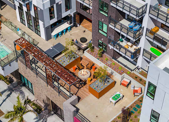 Rooftop terrace with fire pits and landscaped gardens at AMP 30 Apartments, San Diego, 92116