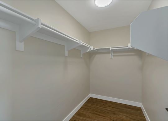 A room with a white ceiling and a white wall with a white floor.