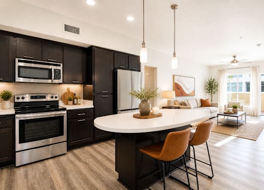 Open kitchen with dark cabinets and island